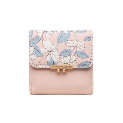 Women's wallet with tri-fold change card bag