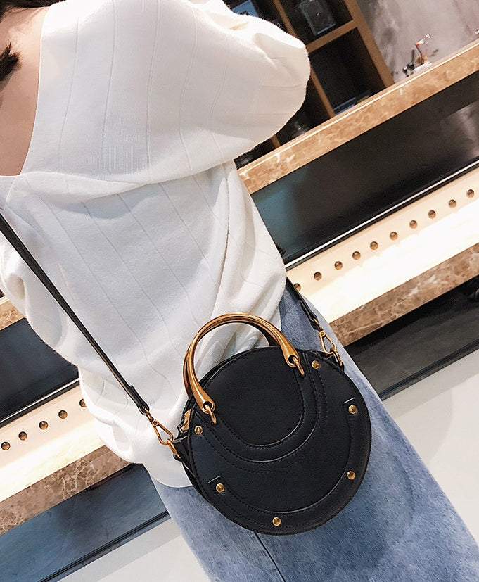 New fashion portable rivet small round bag Korean version of the female bag wild ladies shoulder Messenger bag