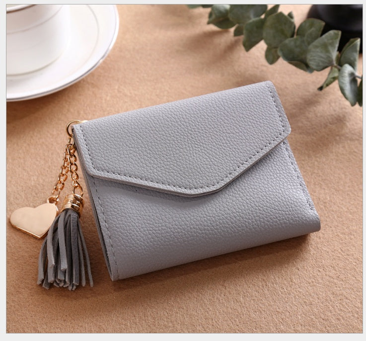 Women's short Korean version of the bag Tassel pendant lychee wallet multi-card position Clutch bag