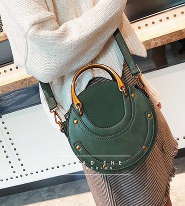 New fashion portable rivet small round bag Korean version of the female bag wild ladies shoulder Messenger bag