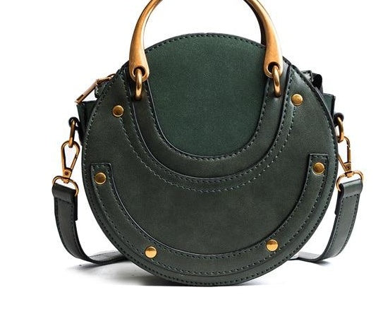 New fashion portable rivet small round bag Korean version of the female bag wild ladies shoulder Messenger bag