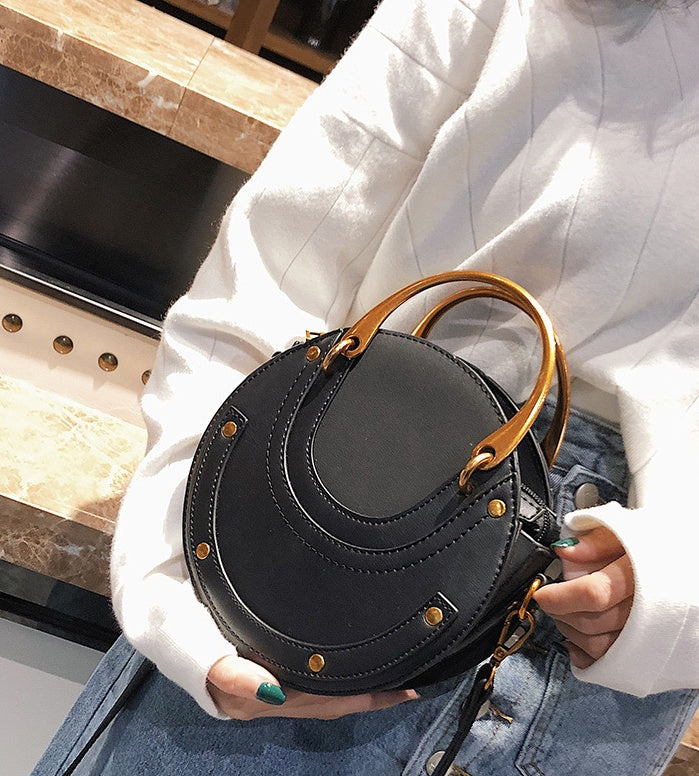 New fashion portable rivet small round bag Korean version of the female bag wild ladies shoulder Messenger bag