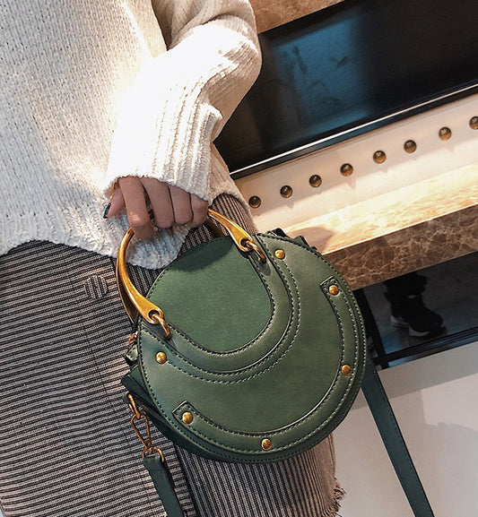 New fashion portable rivet small round bag Korean version of the female bag wild ladies shoulder Messenger bag