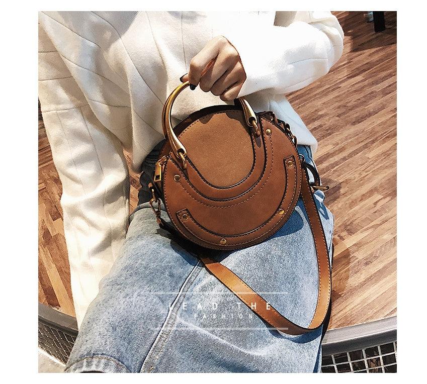 New fashion portable rivet small round bag Korean version of the female bag wild ladies shoulder Messenger bag