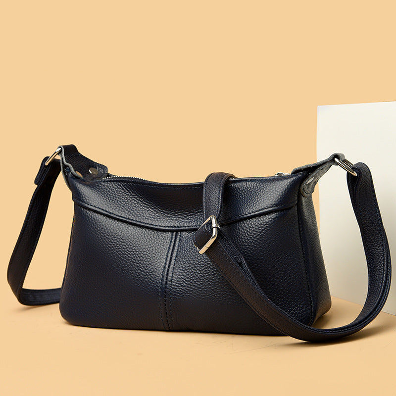 Multi-compartment Shoulder Messenger Bag Women's Large Capacity Cowhide New Moon Bag